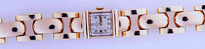 Retro wristwatch with pink and yellow gold puffy links. (J3509)