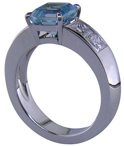 Side view of Aquamarine and Diamond hand-crafted platinum ring.