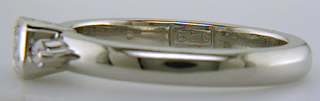 Close-up fo Bijoux Extraordinaire hallmark (BEL).