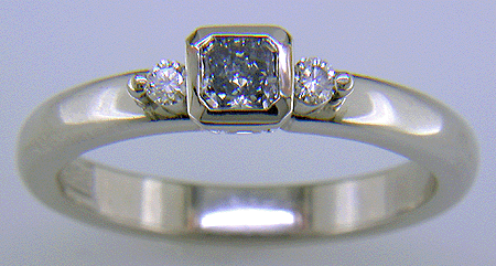 Fancy Intense blue radiant-cut diamond set in a platinum ring.