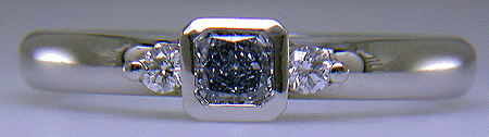 Fancy Intense blue radiant-cut diamond set in a platinum ring.
