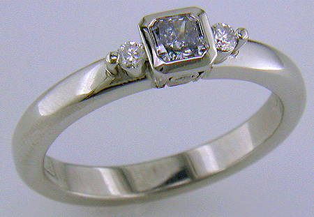 Fancy Intense blue radiant-cut diamond set in a platinum ring.