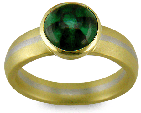 A gold and platinum ring set with a Trapiche Emerald.  (J7258)