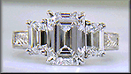 Three Emerald-cut Diamonds in a custom platinum ring.