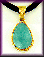 Drusy chrysocolla set in 22kt gold pendant.