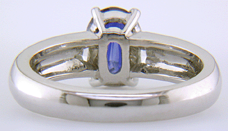 Sapphire and trilliant diamond hand-crafted platinum ring. (J7416)