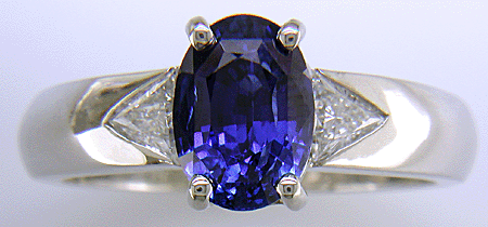 Sapphire and trilliant diamond hand-crafted platinum ring. (J7416)