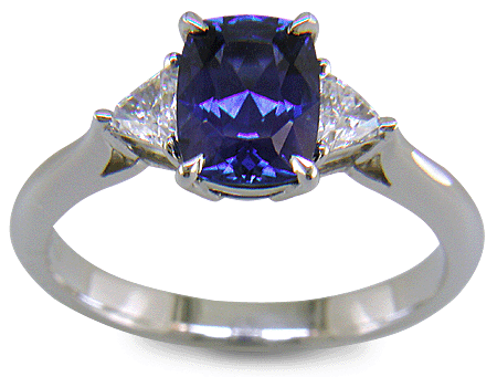 Hand-crafted sapphire and diamond platinum ring. (J8596)