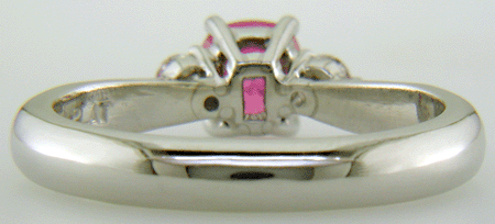 Inside view of Cushion-cut Pink Sapphire set with two round diamonds in a hand-crafted platinum ring. (J8597)