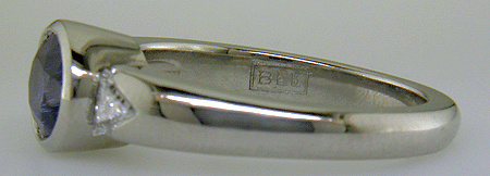 Close-up of Bijoux Extraordinaire hallmark (BEL).