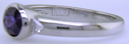 Bijoux hallmark and platinum stamp inside oval sapphire and trilliant diamond ring.