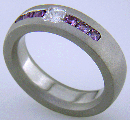 Diamond and sapphire man's custom wedding band crafted in platinum