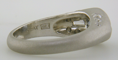 Close-up of Bijoux Extraordinaire's registered hallmark (BEL). (J8433)