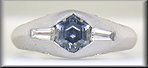Hand-crafted Montana Sapphire and baguette diamond ring crafted in platinum. (J8433)