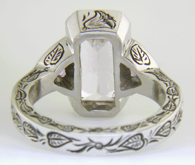 Inside view of White and Lavender Sapphires in a hand-engraved platinum ring.