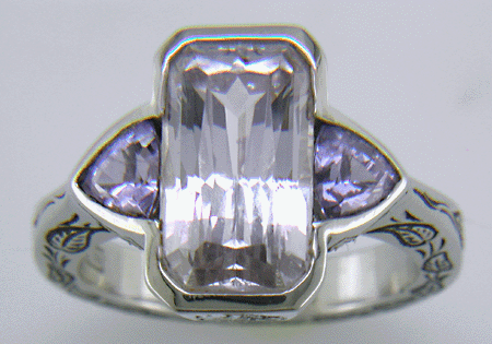 White and Lavender Sapphires in a hand-engraved platinum ring.