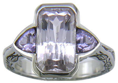 White and Lavender Sapphires in a hand-engraved platinum ring.