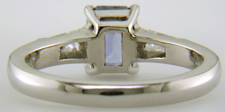 Inside view of Morph-cut Sapphire with tapered baguette diamonds in a custom platinum ring.