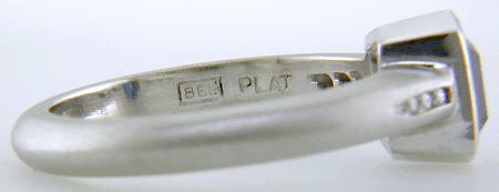 Close-up fo Bijoux Extraordinaire hallmark (BEL). (J8543)