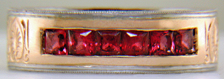 Hand-engraved platinum and rose gold band with Red Spinels. (J7245)