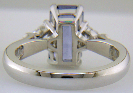 Hand-crafted platinum ring with a emerald-cut pastel Sapphire and sparkling diamonds. (J8541)