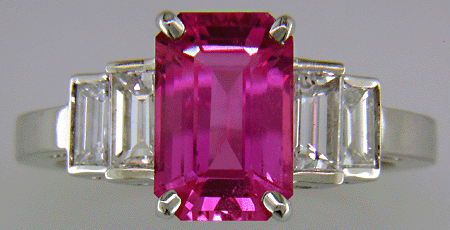 Pink sapphire and diamond hand-crafted platinum ring.