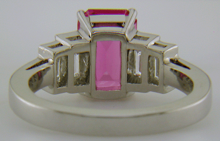 Inside view of pink sapphire and diamond platinum ring.