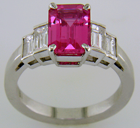 Side view of pink sapphire and diamond hand-crafted platinum ring.