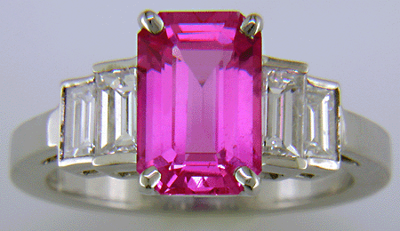 Pink sapphire and diamond hand-crafted platinum ring.