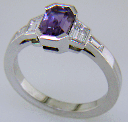 Purple sapphire and diamond hand-crafted platinum ring.