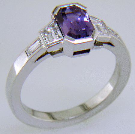 Purple sapphire and diamond hand-crafted platinum ring.