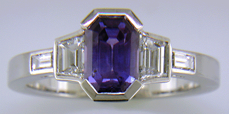 Purple sapphire and diamond hand-crafted platinum ring.