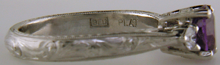 Close-up of Bijoux Extraordinaire hallmark (BEL). (J8525)