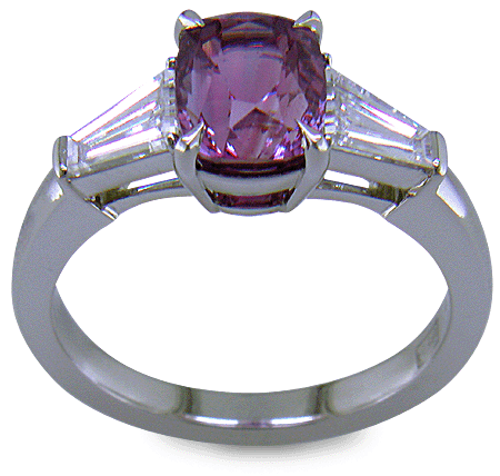 Purple Sapphire with tapered baguette diamonds in a custom platinum ring. (J8644)