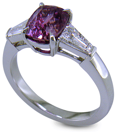 Purple Sapphire with tapered baguette diamonds in a custom platinum ring. (J8644)