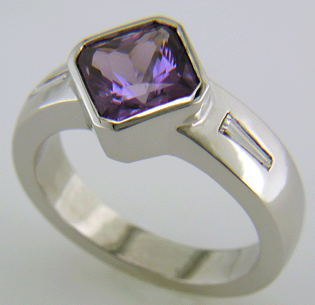 Purple sapphire and diamond hand-crafted platinum ring.