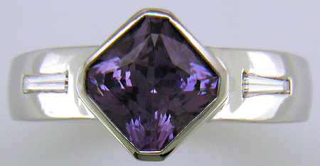 Purple sapphire and diamond hand-crafted platinum ring.