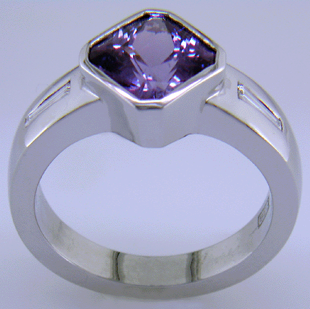 Side view of Purple Sapphire and diamond hand-crafted platinum ring.