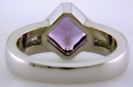 Inside view of Purple sapphire and diamond hand-crafted platinum ring.
