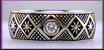 Hand engraved Pysanky ring with diamonds.