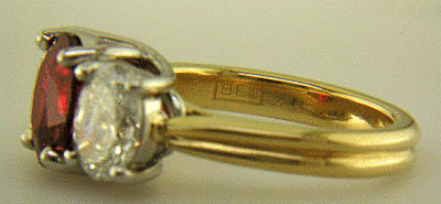 Close-up of Bijoux Extraordinaire hallmark (BEL).