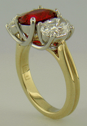 Red Spinel trellis ring set with diamonds.