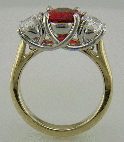 Side view of Red Spinel trellis ring set with diamonds.