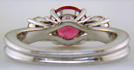Inside view of platinum ring with red spinel and diamonds.