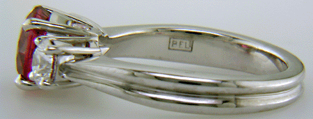 Close-up of Bijoux Extraordinaire hallmark (BEL).