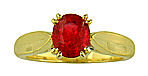 18kt gold ring with a red spinel and two diamonds.
