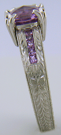 Lavender spinel set with sparkling lilac sapphires in a beautifully hand-engraved platinum ring.