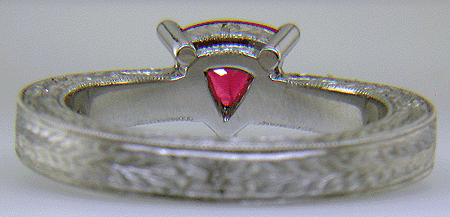 Inside view of hand engraved platinum ring with a trillium red spinel.