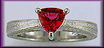 Hand engraved platinum ring with a trillium red spinel.