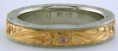 Close up of Bijoux Extraordinaire hallmark, 'BEL', and precious metal marks.